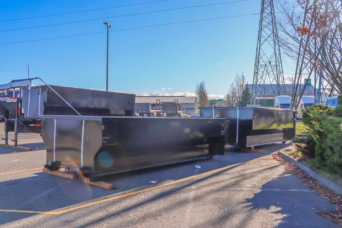 Roll-off dumpster ready for waste disposal at job site for 6 Yard Dumpster Rental in Bloomfield